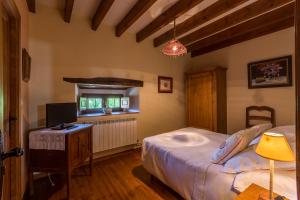 Postel nebo postele na pokoji v ubytování Casavieja Rural