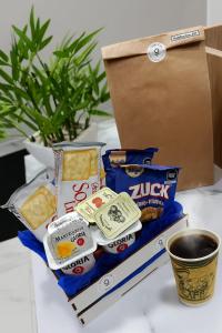 a box of japanese food on a table at Costanera Hotel in San Juan +9 photos