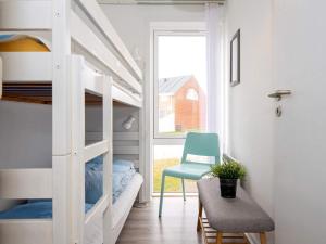 Giường trong phòng chung tại 6 person holiday home in Rømø +39 ảnh