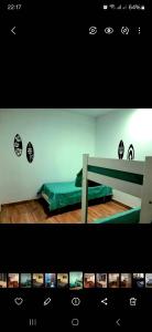 a picture of a bedroom with a bed in a room at Mar y arena in San Clemente del Tuyú
