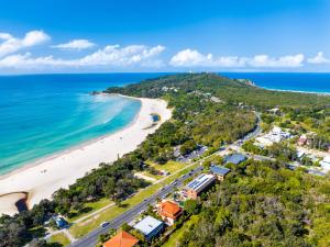 an aerial view of the beach and ocean at Surfrider - Beach front apartment with pool in Byron Bay