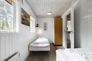 Una cama o camas en una habitación de 3513-Nexo-Dunhammervej-5-B