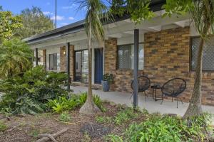 Κήπος έξω από το Palm Hideaway