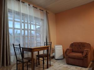 Posezení v ubytování Apartamentos Quepos Karisol Studio + 8 fotografií
