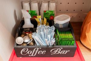 a crate filled with coffee bar items on a table at Riverview APT, Asakusa-Skytree area, 4 min to Metro in Tokyo