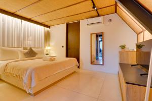 Ένα ή περισσότερα κρεβάτια σε δωμάτιο στο Luxury 4BR Villa Pasisi 12 Canggu +35 φωτογραφίες