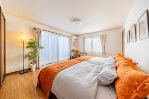 Katil atau katil-katil dalam bilik di Yuka's House-Urawa Spacious & Comfortable, Perfect Base for Tokyo