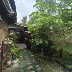 Κήπος έξω από το Villa Milanel Dormitories Port Barton