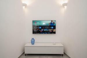 TV a/nebo společenská místnost v ubytování Domus Isola - Cisternino