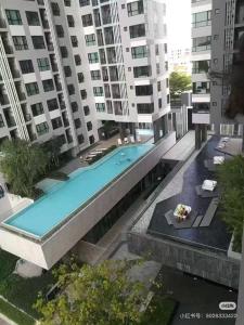 an overhead view of a swimming pool in a building at The Base Pattaya Seaview Condo in Pattaya Central