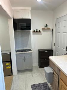 a kitchen with a sink and a counter top at Cozy Bay Area Retreat Near SF, Berkeley & Napa in El Sobrante