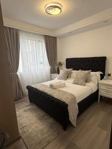 Ένα ή περισσότερα κρεβάτια σε δωμάτιο στο Asali Haven