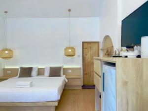 O bucătărie sau chicinetă la Tonsak Resort