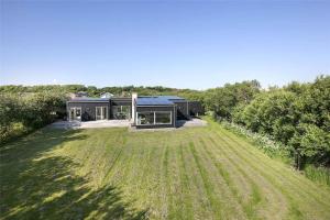 a house with a large yard in front of it at LF299-Vestervig-Ingersvej-21 in Vestervig