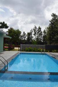 Fotografie z fotogalerie ubytování Sunrise Retreat - Kabini v destinaci Hampāpura