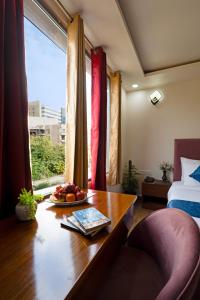 Φωτογραφία από το άλμπουμ του Sarla Hotel Inn - Opp Barclays 62 σε Noida