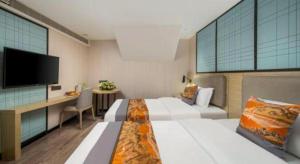 TV/trung tâm giải trí tại Echarm Hotel Xiamen Zhongshan Road Walking Street