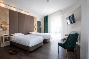 Ένα ή περισσότερα κρεβάτια σε δωμάτιο στο We rooms Shortstay