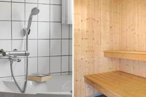 a shower in a bathroom next to a bath tub at 1563-Aakirkeby-Strandparken-8 in Vester Sømarken +21 photos