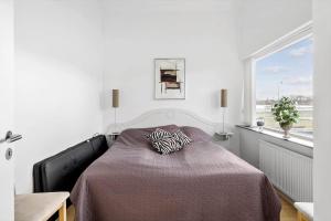 Una cama o camas en una habitación de OH477-Hadsund-Havnen-22