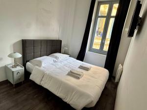 En eller flere senge i et værelse på Villa Mimosa - Cannes