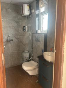 Et badeværelse på Rawat home stays 2