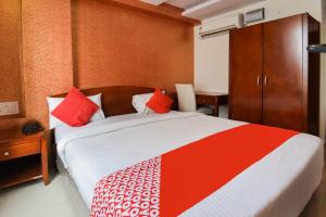 Postel nebo postele na pokoji v ubytování Hotel O Grand Decor + 24 fotografií