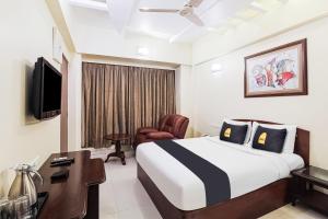 Fotografie z fotogalerie ubytování Townhouse OAK Hotel Shubhangan Near Juhu Beach v Bombaji