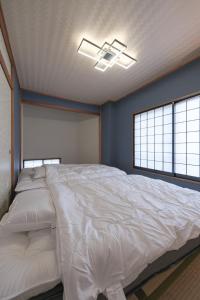 Katil atau katil-katil dalam bilik di 65m2 Free parking Modern Japanese style Toys for kids Great sunlight Kids can relax