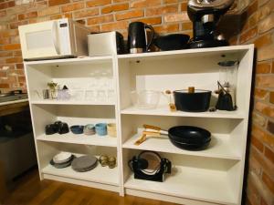 Afbeelding uit fotogalerij van Charming Home with Rustic Brick Walls Quiet Area, 15 min to Gimpo Airport  +3 foto's