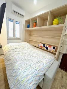 a bedroom with a large bed in a room at Studette tout équipée centre ville de Nice in Nice