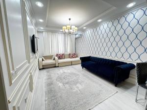 Χώρος καθιστικού στο Высотные апартаменты у Мега Silk Way +3 φωτογραφίες