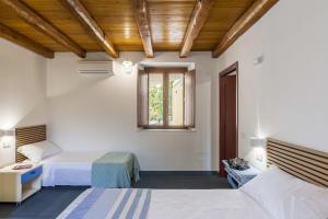 Ένα ή περισσότερα κρεβάτια σε δωμάτιο στο Casa Giacu Holiday Home