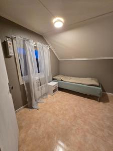 Katil atau katil-katil dalam bilik di Stortindveien6 with 3 bedrooms