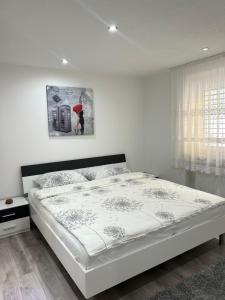 Postel nebo postele na pokoji v ubytování Ferienwohnung Gani - Kißlegg