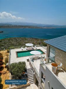 an aerial view of a house with a swimming pool at Seacrete villas in Chania