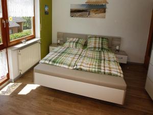 Postel nebo postele na pokoji v ubytování Ferienwohnung Lilly