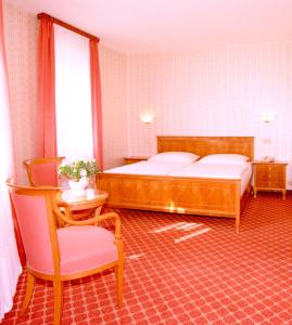 Ένα ή περισσότερα κρεβάτια σε δωμάτιο στο Hotel An Der Wien