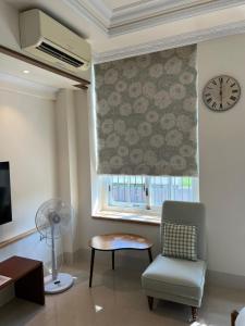 Posezení v ubytování 屋子旅店 + 35 fotografií