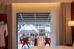 a room with a view of a living room at Viriya Hotel in Luang Prabang