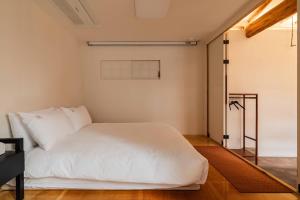 Ένα ή περισσότερα κρεβάτια σε δωμάτιο στο Luxury Hanok Stay CHAON