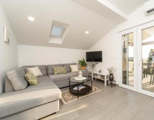 Μια τηλεόραση ή/και κέντρο ψυχαγωγίας στο Sunny beach apartman Nin