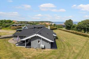 an overhead view of a house in a field at 6840-Allinge-Gjedelokken-23 in Allinge