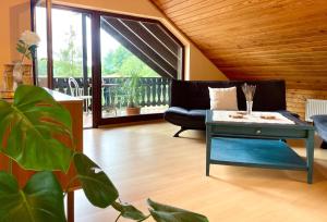 Posezení v ubytování Wohnung im Landhaus - Natur mit Balkon & Garten