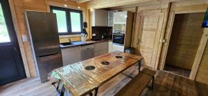 Kuchyň nebo kuchyňský kout v ubytování Chalet confortable à Les Deux Alpes 77 m² avec vue + 11 fotografií