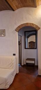 Ένα ή περισσότερα κρεβάτια σε δωμάτιο στο Casa Leonardo