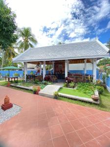 Taman di luar Sadakham Green Garden Hotel