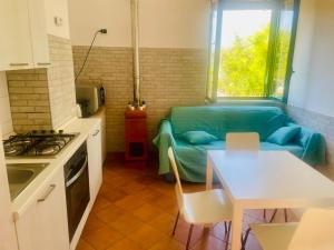 Kuchyň nebo kuchyňský kout v ubytování Il Giardino di Rosa & Elino + 11 fotografií