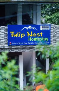 Chứng chỉ, giải thưởng, bảng hiệu hoặc các tài liệu khác trưng bày tại Tulip Nest Homestay