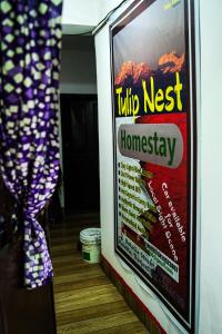 Chứng chỉ, giải thưởng, bảng hiệu hoặc các tài liệu khác trưng bày tại Tulip Nest Homestay
